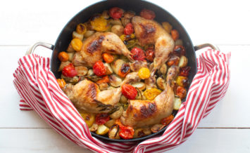 Crispy chicken legs with mixed Isle of Wight cherry tomatoes, leeks and potatoes